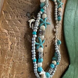 Turquoise and Silver Starfish and Dolphin Necklace